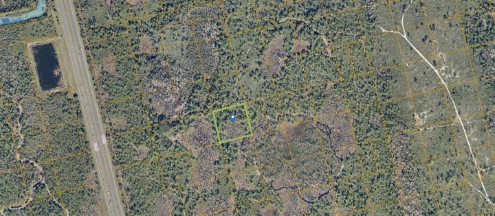 Photo 1 of 3 — COUNTY LINE DITCH RD, OAK HILL,, FL 32759