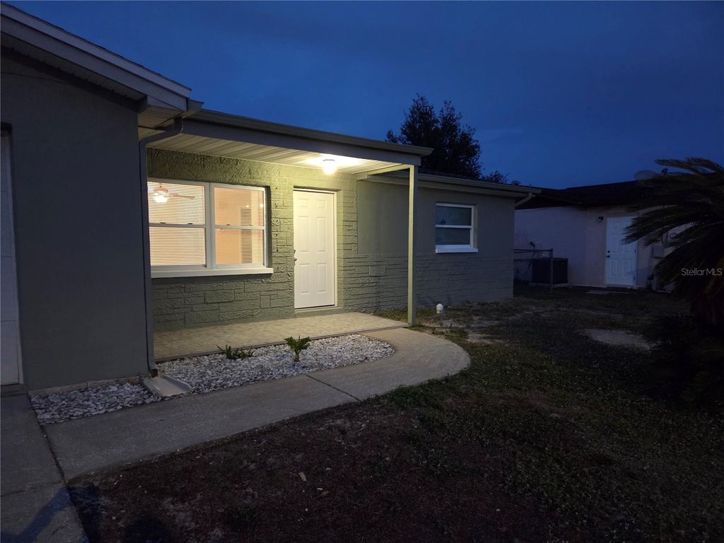 Photo of 8227 Saybrook Drive, Port Richey, FL 34668 (MLS # TB8452581)