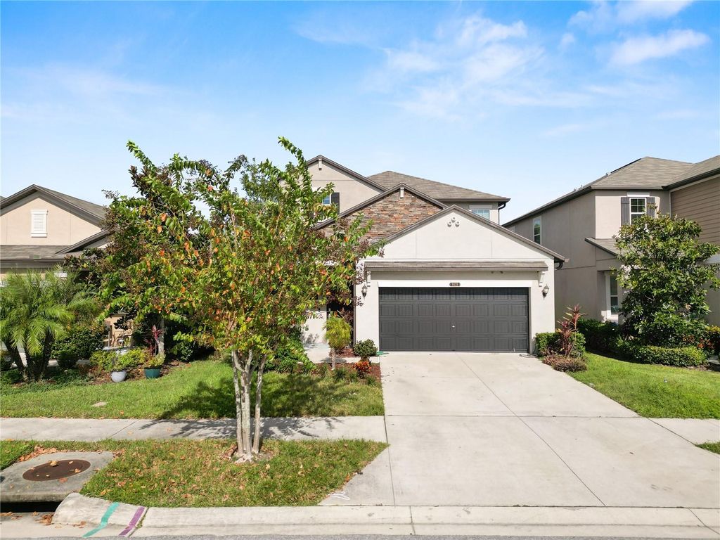 Photo of 9039 Pleasant Woods Drive, Land O Lakes, FL 34637 (MLS # L4956728)