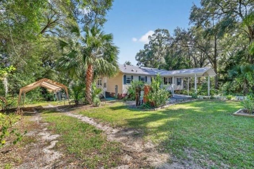 Photo of 5841 SE 164th Avenue, Ocklawaha, FL 32179 (MLS # TB8456265)