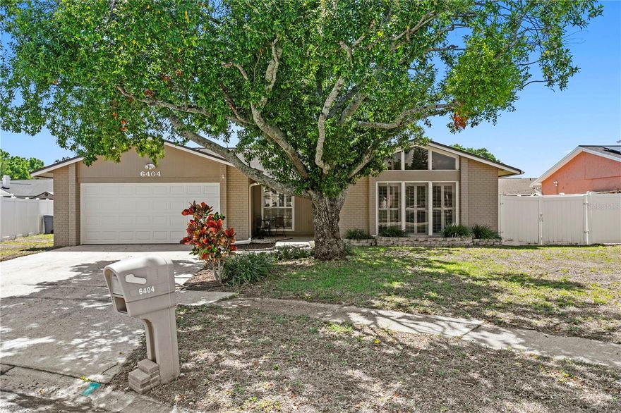 **Take a VIRTUAL VIDEO TOUR of this home now at 6404Heathermoor.com** Welcome home to this move-in-ready Twelve Oaks 3 bed, 2 bath, 2 car garage, ranch home. With 1,500 sqft, this move-in-ready home is situated on a beautiful cul-de-sac & non-flood zone lot with a fully fenced backyard.  As you arrive, you’ll find a mature oak tree, welcoming courtyard entrance and neutral exterior colors.  Upon entering, you’ll find newer luxury vinyl plank flooring throughout the main living areas – allergy friendly with no carpet anywhere in this home.  The combined formal living and dining rooms are accented by 11ft vaulted ceilings, large windows and custom plantation shutters.  Head through the foyer into the updated kitchen featuring quart counters, wood cabinets, pendant lighting, glass tile backsplash and plenty of cabinet storage.  Beyond is the family room with a decorative wood accent wall, ceiling fan and sliding glass doors leading out to the screened lanai and fully fenced backyard, including a 6 ft vinyl privacy fence.  Down the hallway from the family room are the 2nd and 3rd bedrooms, both with ample closet storage.  The primary suite is in the back corner of the home and features oversized windows with backyard views, 2 large closets and a full ensuite bath with a tub/shower combo.  Just off the primary suite is the 2nd full bath that includes a tub/shower combo.  The inside utility room offers additional storage and leads out to the oversized 2-car garage.  Just 3 houses away is the community lake where you can enjoy waterside views or try your luck at fishing.  Additional upgrades include a dimensional shingle roof replaced in 2014, HVAC in 2018, kitchen remodel in 2020, multiple plantation shutters, all popcorn ceilings have been removed and a new electrical panel has been installed.  Twelve Oaks is an ultra-convenient community of 1,000 homes and has Target, Lowes, Office Depot, Walmart, Publix, Walgreens and BJ's Warehouse all w/in 1 mile & minutes away from TIA.