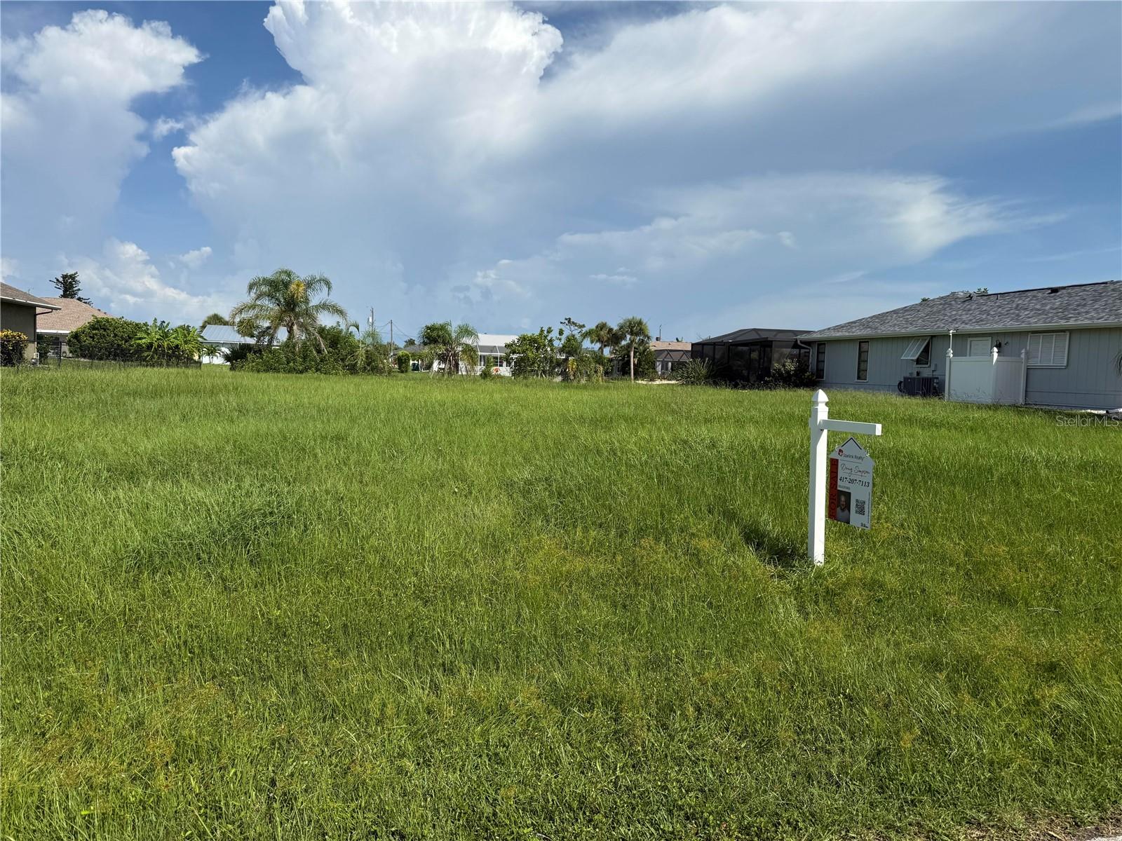 Save money!!! Already permitted for a beautiful 1877 sqft 3 bed 2 bath + den, 3 car garage home. Comes with building plans to use if so desired. Land is already up to building elevation. Waterfront Lot in Rotonda West – 79 Ft of Freshwater Canal Frontage!
Discover the perfect opportunity to build your dream home in the highly desirable Pebble Beach section of Rotonda West. This premium buildable lot offers 79 feet of serene freshwater canal frontage, providing peaceful water views and direct access to one of the community’s 23 miles of scenic canals.
Nestled along a quiet loop of homes bordering the golf course, this lot presents a unique combination of waterfront living and recreational convenience. An adjacent vacant lot is also available for separate purchase—combine both for an expansive homesite with endless design potential!
Located in a tranquil, deed-restricted community surrounded by nature preserves, lakes, and walking trails, Rotonda West is ideal for those who enjoy the outdoors. Enjoy fishing, kayaking, and wildlife observation, or take advantage of the Rotonda Community Park, which features a playground, tennis and pickleball courts, bike trails, and picnic areas with grills.
Golf enthusiasts will love being minutes from five championship golf courses within the community, while nearby Gulf of Mexico beaches offer the perfect coastal escape.
Whether you're looking for a peaceful retreat, an active lifestyle, or a bit of both—this lot is the perfect canvas. Build your vision of paradise today!