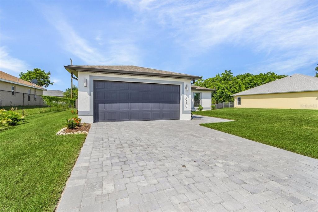 Photo of 3010 NE 6th Place, Cape Coral, FL 33909 (MLS # C7516031)