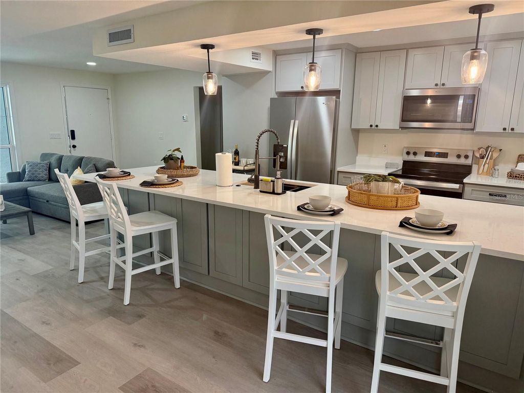 Photo of 337 Rex Place #B, Madeira Beach, FL 33708 (MLS # TB8479416)