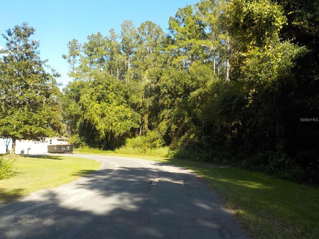 Photo of 11641 N Kenlake Circle, Dunnellon, FL 34434 (MLS # OM716706)