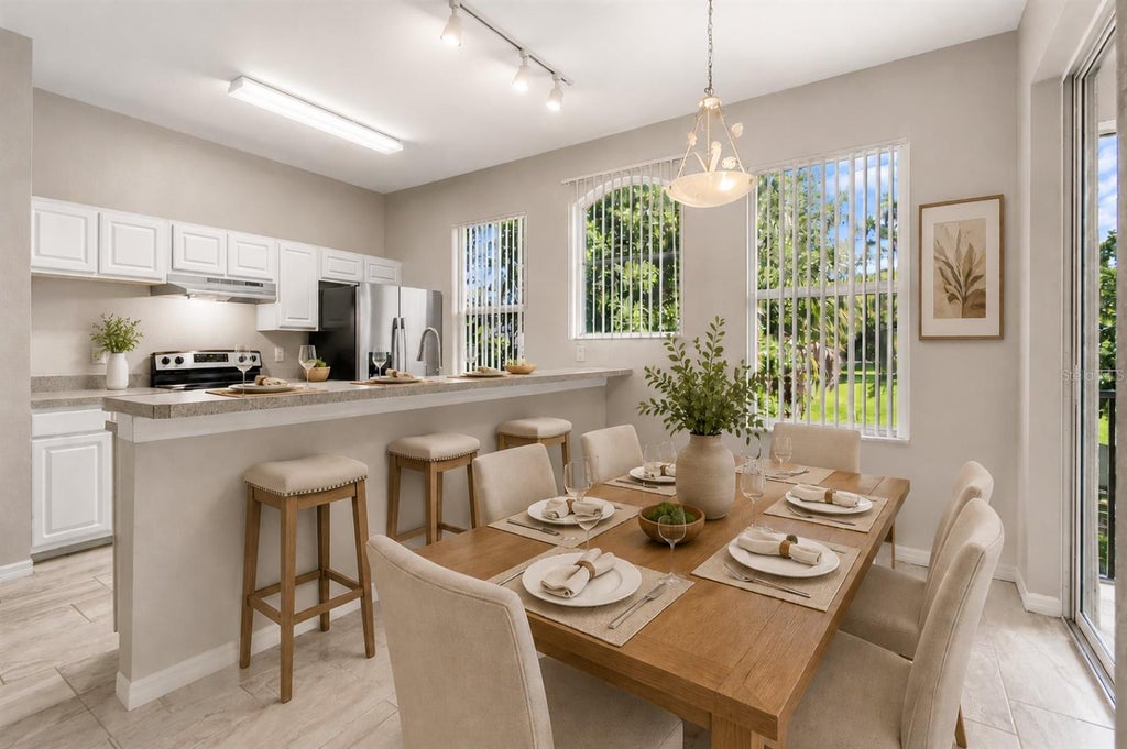 Photo of 5039 Sunridge Palms Drive #203, Tampa, FL 33617 (MLS # TB8521855)