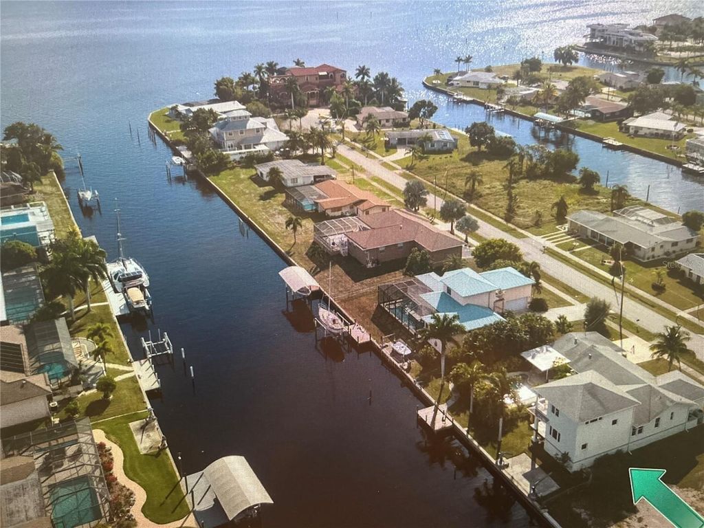 Photo of 217 Bangsberg Road SE, Port Charlotte, FL 33952 (MLS # N6142823)