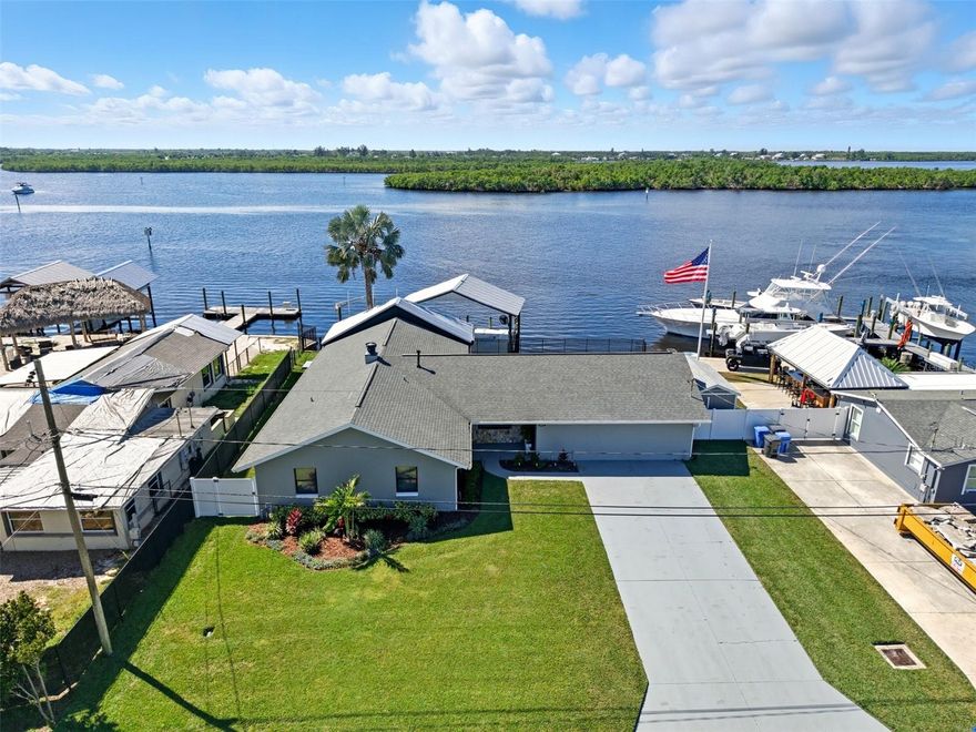 This is it! Calling all boating/fishing enthusiast to this must see waterfront home. Breathtaking views with stunning finishes throughout. This meticulously maintained 3/3 sits on Shell Point at the mouth of the little Manatee River. The interior upgrades and finishes speak for themselves with plank style tile floors, real wood cabinetry, stone countertops , updated lighting/fans and bathrooms. Cathedral ceilings, and open concept living that is sure to impress. This is the definition of turn-key. The spacious, covered and screened patio leads out to your covered boat dock and lift. Brand new Delco 16klb lift for up to a 34‘ vessel, new pedestal with 30 amp and 110 plug in, with water at dock for wash down. The deep water canal draft is 5.5 feet. This is directly west of Shell Point Marina that has non ethanol fuel 24/7. 13 miles to the skyway bridge, 17 miles to the Gulf of Mexico, less than 20 minutes to Tierra Verde area by boat.  From your dock, less than 5 minutes of idle speed to open running in the channel. Unique ability for bait pens to keep bait year round. Views to the south are all protected by the state so no development concerns. All this with the best sunsets you will ever see, direct view at that time to St. Pete. NO HOA, NO CDD. Don't delay, contact today to schedule your showing.