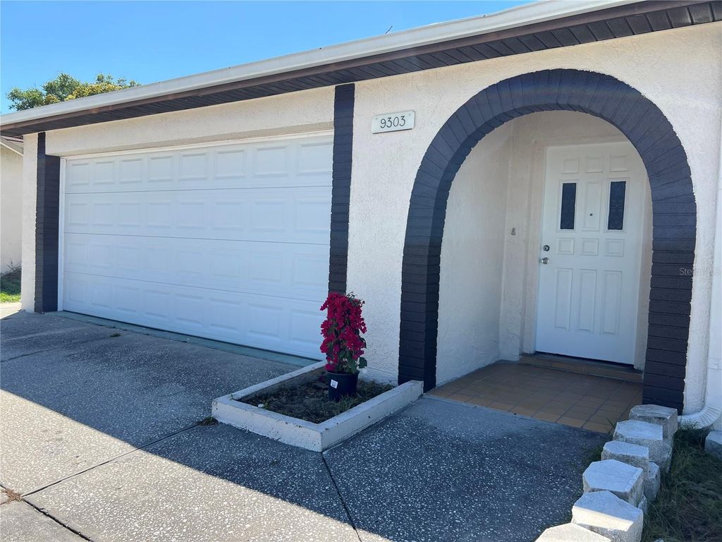Photo of 9303 Morehead Lane, Port Richey, FL 34668 (MLS # TB8489509)