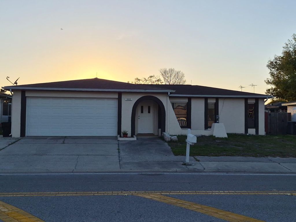 Photo of 9303 Morehead Lane, Port Richey, FL 34668 (MLS # TB8489509)