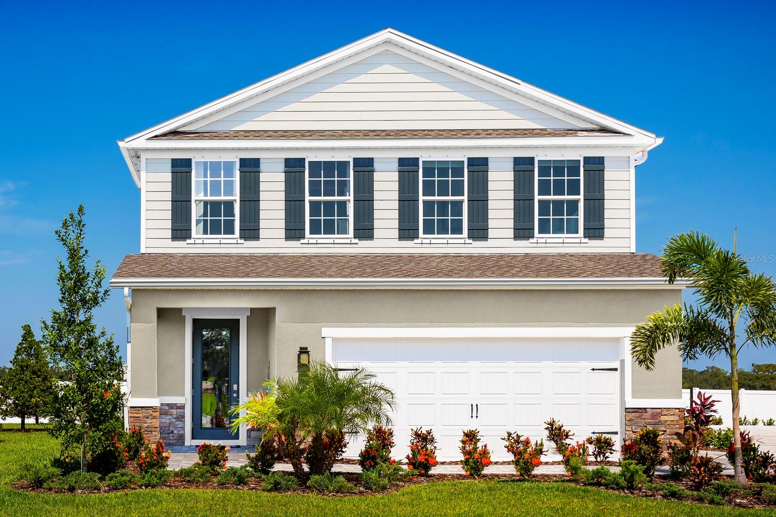 Pre-Construction. To be built. Welcome home to Overlook at Grassy Lake, located in the charming city of Minneola, just one mile to the Turnpike and the area’s best shopping, dining, and entertainment. Minneola has a wide variety of outdoor recreation, including Lake Hiawatha Preserve, Minneola Sports Complex, and more, only 10 minutes away. Our amenity center was built with you in mind featuring a resort-style pool and cabana, the perfect place to relax. You’ll appreciate our outdoor space that the whole family can enjoy, including a tot lot for the kids. Our private homesites feature options for pond and nature views, with no rear neighbors - the perfect backdrop for your outdoor oasis. Build an outdoor kitchen, entertaining space, or a fire pit – the opportunities are endless. Make it your own with our professionally-designed interior palettes. The Windermere single-family home is where you want to be. Step in from the 2-car garage and enjoy the good life. Find it in the large family room, where smiling faces greet you and delicious smells fill the gourmet kitchen. Share stories around the island or outside on the lanai. The 1st floor features a main-level bedroom with it's own bathroom. Upstairs, 3 bedrooms and a full bath provide privacy while a loft adds extra entertaining space. Your deluxe owner’s suite includes double vanities, a seated shower and a walk-in closet, making The Windermere can’t-miss. All Ryan Homes now include WIFI-enabled garage opener and Ecobee thermostat. **Closing cost assistance is available with use of Builder’s affiliated lender**. DISCLAIMER: Prices, financing, promotion, and offers subject to change without notice. Offer valid on new sales only. See Community Sales and Marketing Representative for details. Promotions cannot be combined with any other offer. All uploaded photos are stock photos of this floor plan. Actual home may differ from photos.
