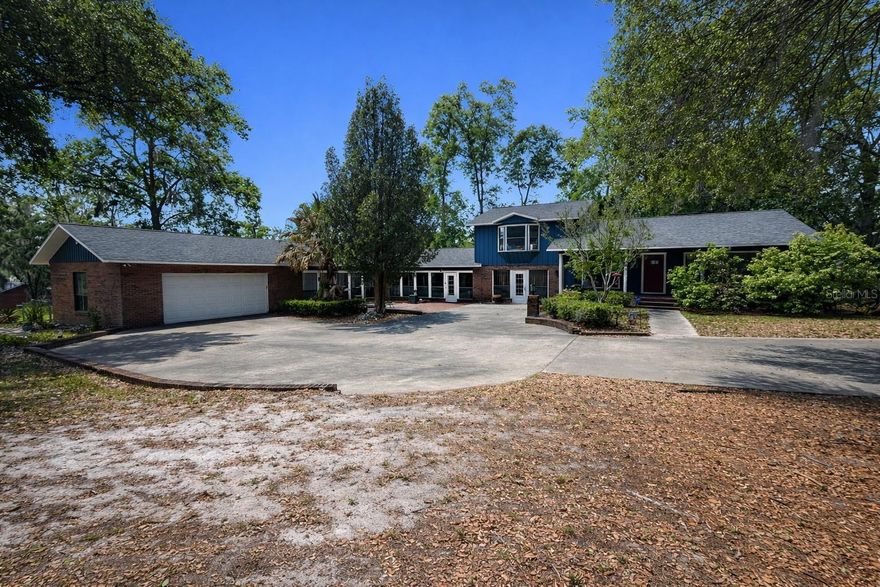 This is not a typical home. It’s a rare opportunity to own a highly functional, flexible property in one of High Springs’ most desirable locations. Offering over 3,700 sq ft, the home is well-suited for multi-generational living or flexible use, with a layout that supports both independent living areas and shared spaces. A standout feature is the presence of two full kitchens, creating natural separation ideal for in-law arrangements, guest quarters, or extended family living. The home also includes an expansive 40x30 flex space, offering versatility for a home business, studio, gym, or additional living area. With two fireplaces and multiple gathering areas, the layout comfortably supports both everyday living and larger gatherings. Recent updates include a brand new roof, updated HVAC systems (2019–2020), and replaced water heaters, contributing to strong overall condition and long-term reliability. Additional features include a central vacuum system, multiple laundry hookups, and existing whole-home intercom/audio infrastructure. Situated on a hillside lot with no flood risk and no HOA, the property offers flexibility rarely found in today’s market. Located within walking distance to downtown High Springs, schools, and local amenities. And don't forget the spacious 2-car garage, offering ample room for all your tools, storage needs, and recreational gear. Call me today for your private showing! This home will not last long!