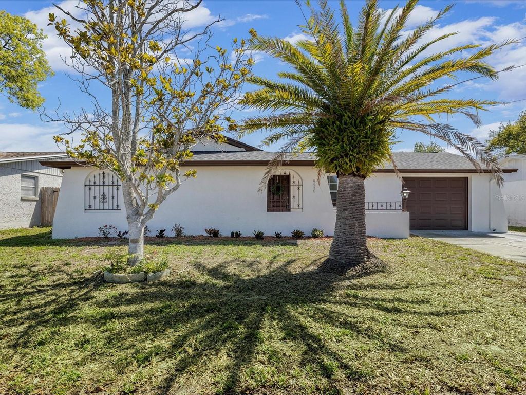 Photo of 9430 Glen Moor Lane, Port Richey, FL 34668 (MLS # TB8488033)