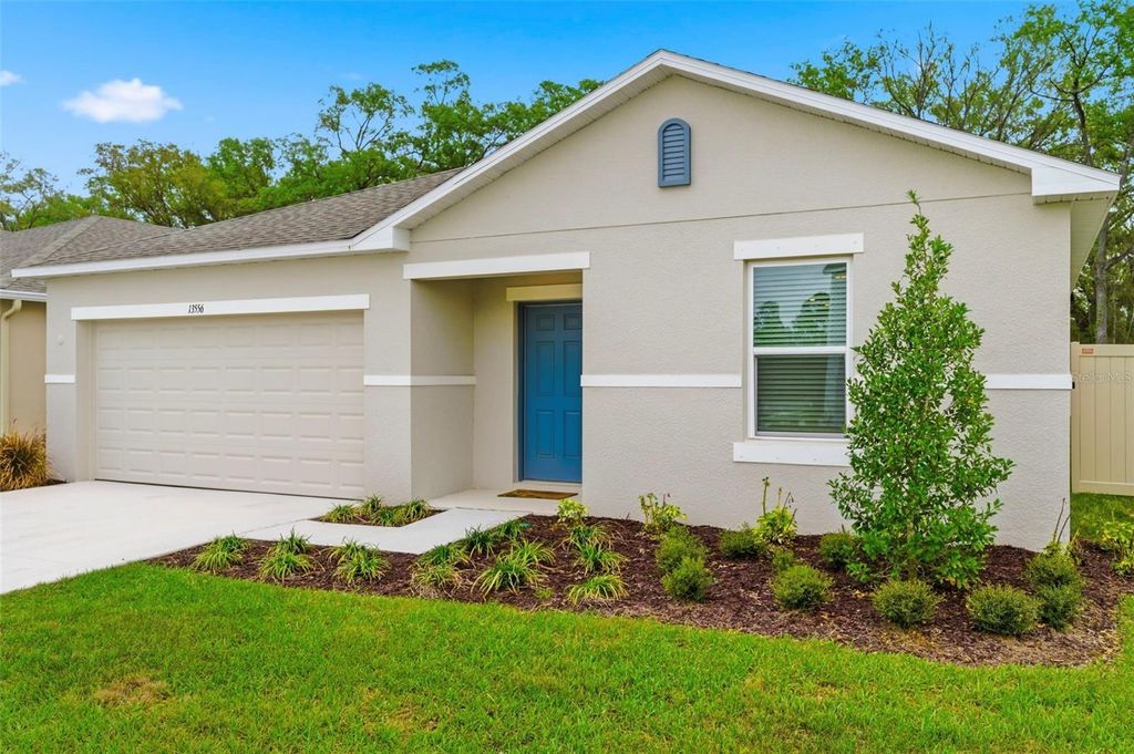 Photo of 13556 Tropical Breeze Way, Hudson, FL 34669 (MLS # TB8486941)