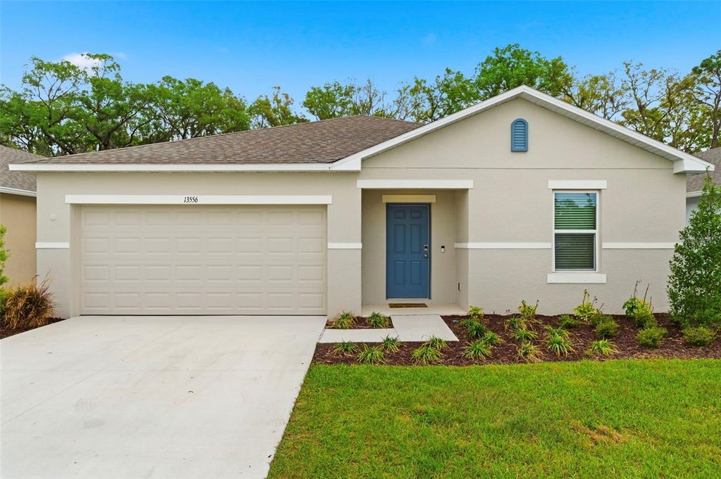 Photo of 13556 Tropical Breeze Way, Hudson, FL 34669 (MLS # TB8486941)