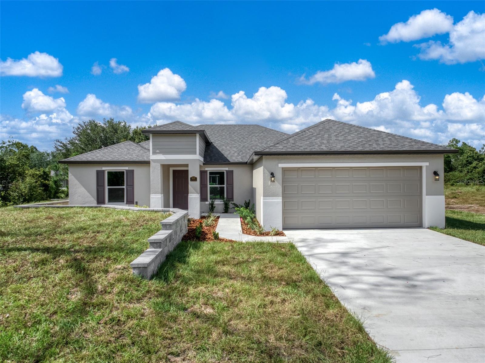 NEW home is ready to move in! Local builder Amaral Homes ensures quality finishes with a focus on the details. Beautiful location in Sun N Lake of Sebring. 4 bedrooms with 2 bathrooms. LVP floors throughout with upgraded lighting and fixtures. Large kitchen with lots of cabinets, granite counters and stainless appliances. Center island with bar seating. Split floor plan offers privacy in the master bedroom. 2 large walk in closets. Spa like bathroom includes enormous shower and soak tub alongside a dual vanity. Private commode room. 3 other bedrooms on opposite side of home share the 2nd full bathroom with tile surround tub/shower combo and granite counters. Inside laundry/mud room. Large yard has room for outdoor entertaining and is landscaped with irrigation. Beautiful Sun N Lake of Sebring offering 36 holes of championship golf, community pool, tennis and pickleball, dog park, disc golf, corn hole and community activities all year long! Take a golf cart ride around this wonderful community with miles of streets to explore including a nature preserve. Medical and emergency services close by. NO HOA
