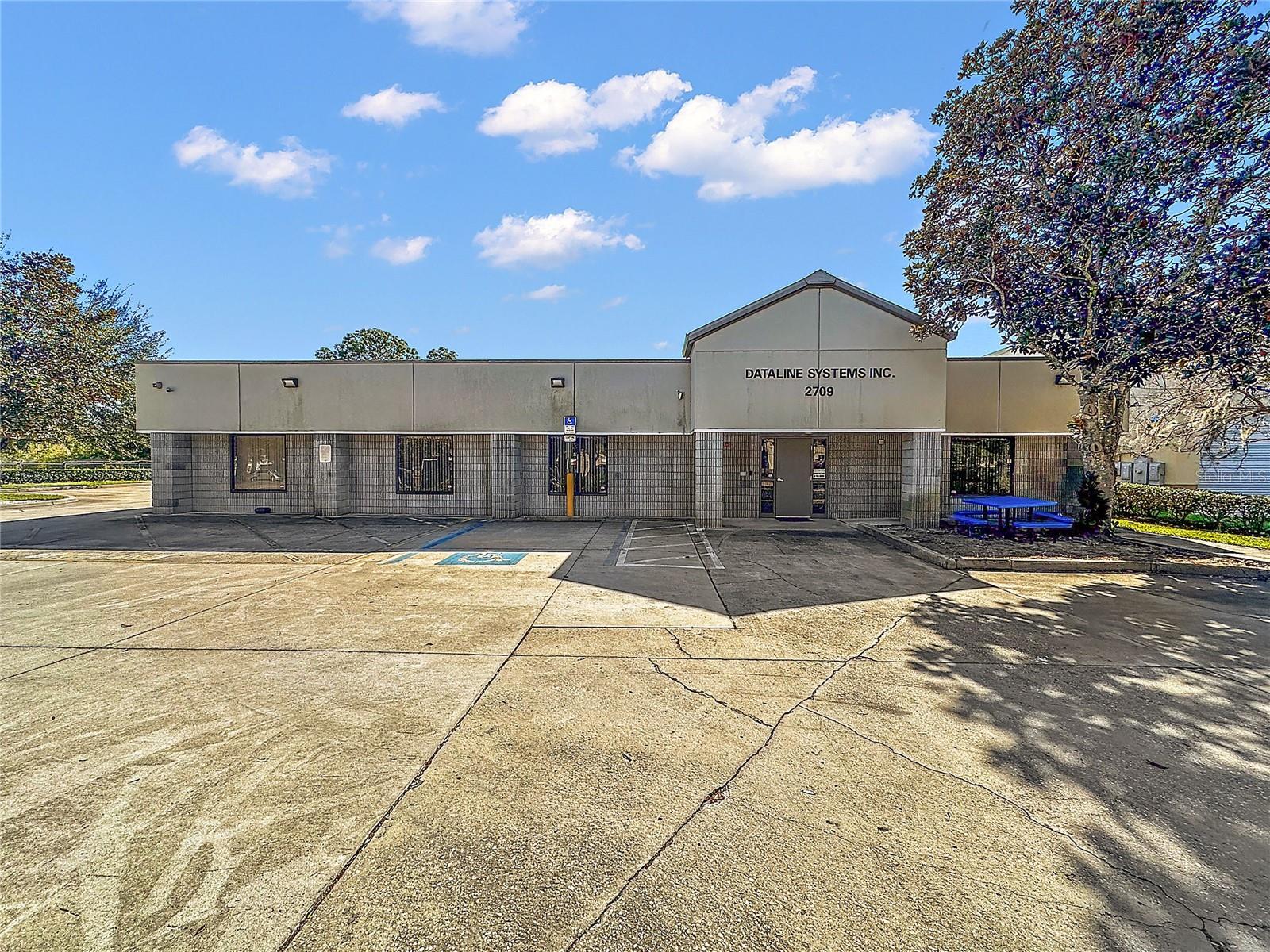 ORANGE BLOSSOM BUS CENTER - Commercial Lease