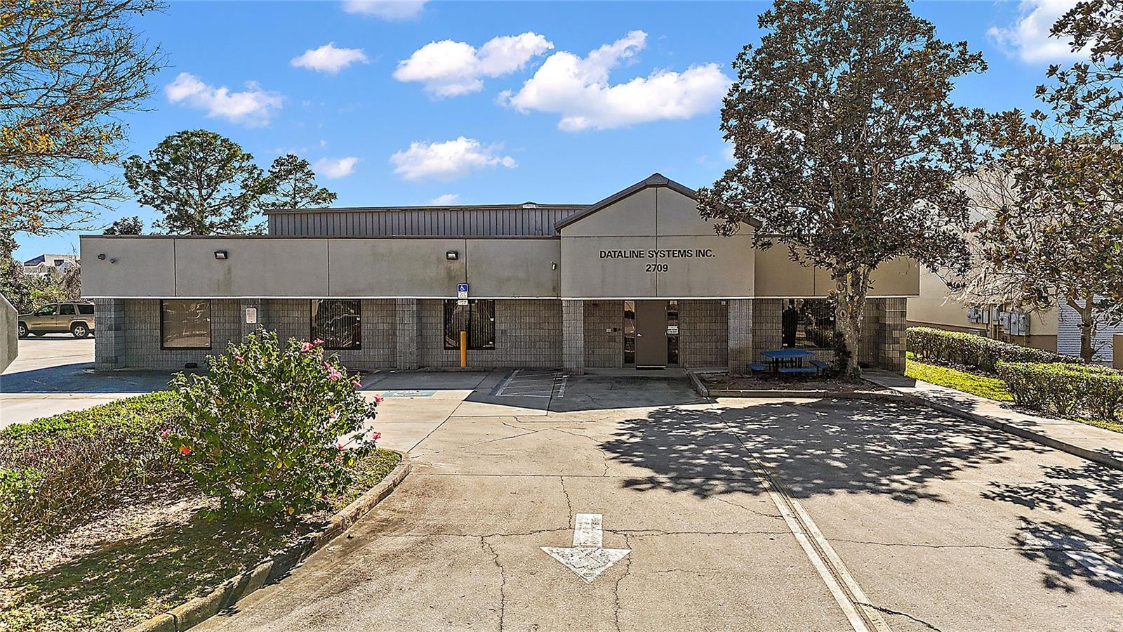ORANGE BLOSSOM BUS CENTER - Commercial Lease
