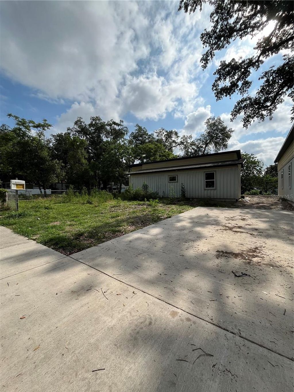Photo of 1042 36th Street, Orlando, FL 32805 (MLS # O6406543)