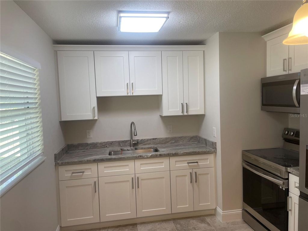 Photo of 420 E Virginia Avenue #420, Punta Gorda, FL 33950 (MLS # C7517707)