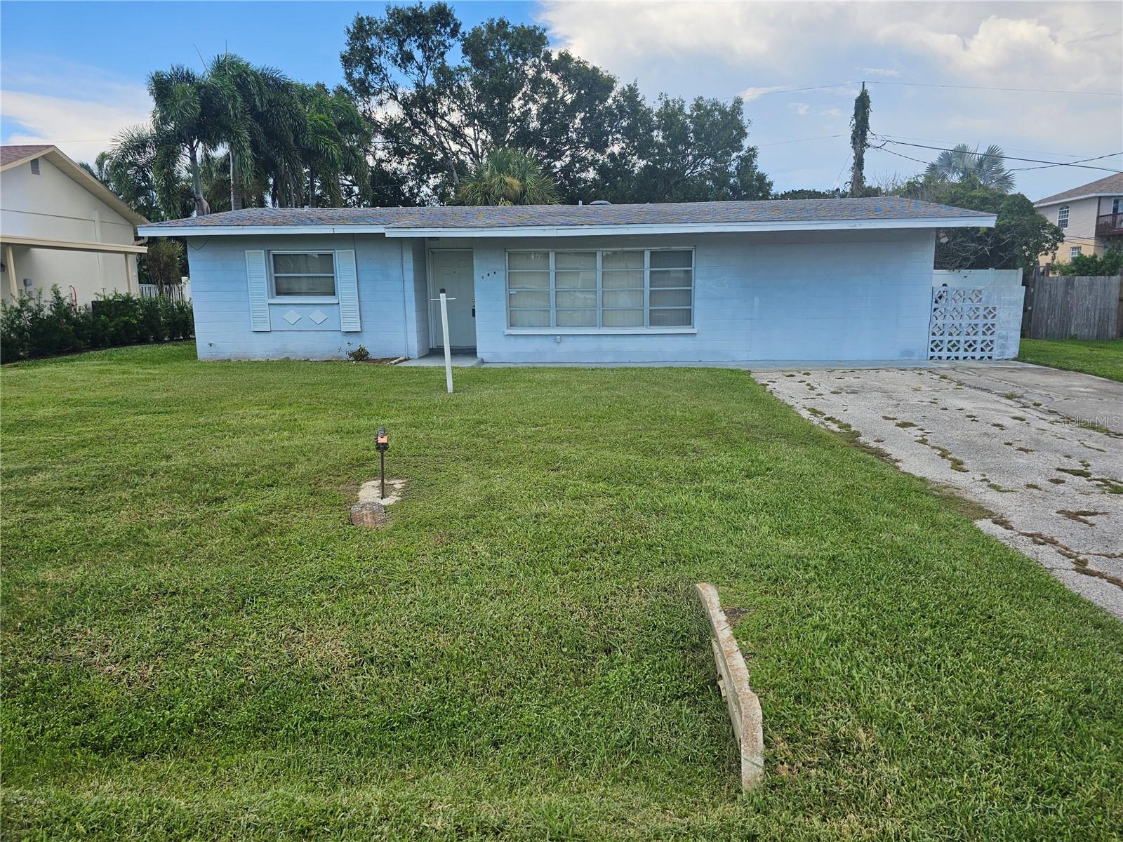 ATTENTION INVESTORS. Here is your next project. This 3/1 could easily become a 4/2. Has a caged pool. The Utility room and den have washer dryer hook ups.
The flood damage from the hurricane is gone. The AC and Electric are good. All appliances are gone ready to be replaced. NO HOA fee. Access to the boat launch is grandfathered into the property. Very close to the bay and gulf. This has a ton of potential. Located in Palmetto Point Subdivision. You will enjoy NO HOA FEES. This is vacant and ready to show....do yourself a favor and go take a look