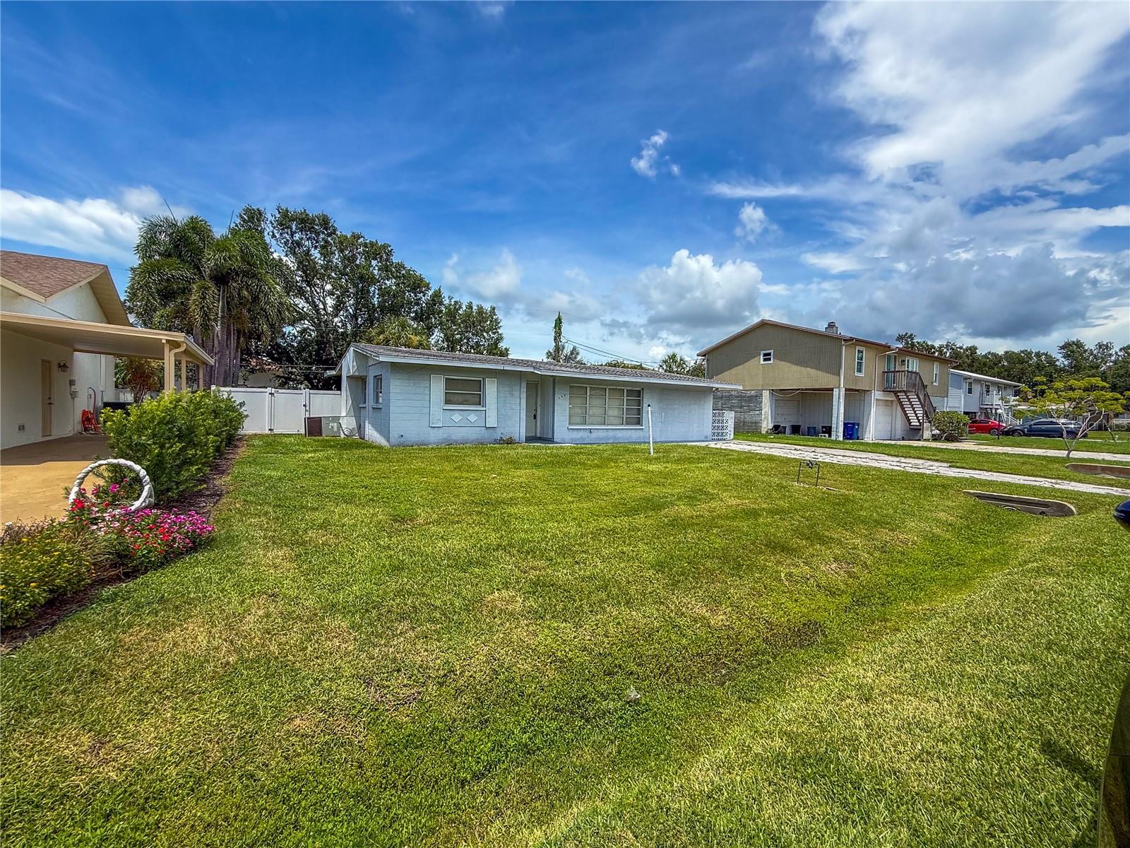 ATTENTION INVESTORS. Here is your next project. This 3/1 could easily become a 4/2. Has a caged pool. The Utility room and den have washer dryer hook ups.
The flood damage from the hurricane is gone. The AC and Electric are good. All appliances are gone ready to be replaced. NO HOA fee. Access to the boat launch is grandfathered into the property. Very close to the bay and gulf. This has a ton of potential. Located in Palmetto Point Subdivision. You will enjoy NO HOA FEES. This is vacant and ready to show....do yourself a favor and go take a look