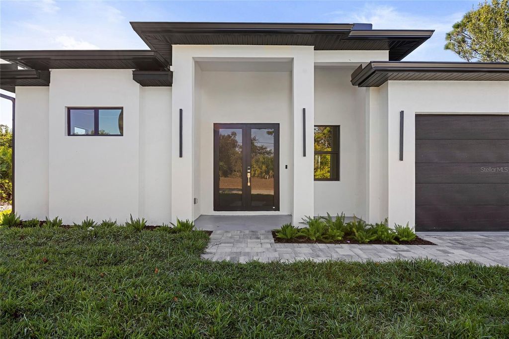 Photo of 115 Baytree Drive, Rotonda West, FL 33947 (MLS # C7522640)