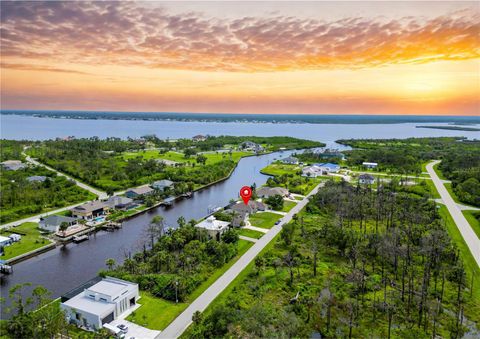 Photo of 13045 Irwin Drive, Port Charlotte, FL 33953 (MLS # TB8399337)