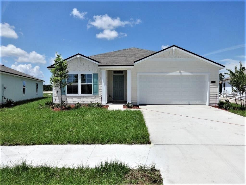 Photo of 9 SUMMERWOOD ROAD S, PALM COAST, FL 32137 (MLS # FC290739)