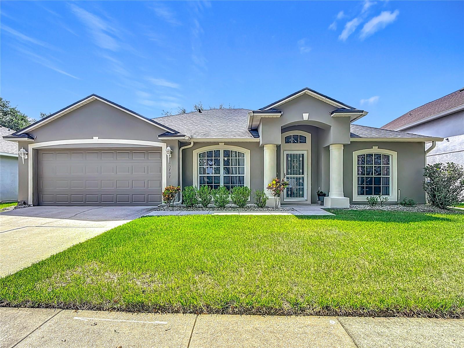 STUNNING FALCON TRACE HOME - MINUTES TO DISNEY WORLD! Resort-style living without the maintenance headaches. This captivating 3-bedroom, 2-bathroom home in Orlando's desirable Falcon Trace offers the perfect blend of private luxury and community paradise. Gleaming stainless steel appliances complement the large center kitchen island, while luxury vinyl and tile flooring flow throughout 1,852 square feet.
Natural light floods the home through skylights, creating bright, welcoming spaces that seamlessly connect to your private screened-in porch. This bug-free outdoor sanctuary provides year-round enjoyment - the ultimate Central Florida lifestyle feature! The fenced backyard ensures privacy and security. Enjoy unbeatable community amenities including resort-style pools with waterslide, lighted tennis and basketball courts, scenic lake with fishing dock, and BBQ grills - all maintained professionally for just $500 annually. No pool maintenance headaches here!
TARGET DIRECTLY ACROSS THE STREET for ultimate convenience, with A-rated Endeavor Elementary nearby. Just 15 minutes to Disney World, 20 minutes to Orlando International Airport, and walking distance to Hunter's Creek Plaza shopping and dining. Turn-key ready and currently income-producing, this Falcon Trace gem won't last long in today's market!
