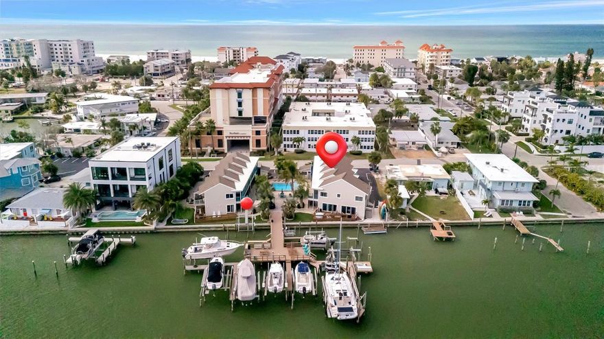 Exceptional Waterfront Investment Opportunity at Five Palms Mini Resort — Including Deeded Boat Slip & Lift (Slip #13)!
Own your slice of paradise on Clearwater Beach with this beautifully furnished 2nd-floor pool-view suite, deeded with its own private boat slip and lift, a rare and highly valuable feature. Ideally positioned just steps from the Intracoastal Waterway, Suite 204 offers relaxing water views from the front porch and a warm, inviting interior designed for comfort and repeat guest appeal.  This condo features a fully equipped kitchen with full-size appliances, tropical furnishings, and a king-size bed, creating a true “home away from home” experience for both owners and guests. An on-site rental management office, open seven days a week, professionally handles short-term rentals, guest services, and bookings, with many repeat visitors returning year after year.  Resort-style amenities include a heated pool surrounded by lush tropical landscaping, a newly completed community dock ideal for dolphin and manatee watching, BBQ grilling areas, mini-golf, shuffleboard, and an impressive selection of complimentary amenities including bikes, kayaks, beach chairs, and fishing gear.  Five Palms has completed numerous capital improvements in recent years, including the roof, windows, sliders, siding, exterior painting, and blacktop, with additional updates planned. Each unit includes one assigned parking space, with limited street parking available for additional vehicles.  Located on the desirable north end of Clearwater Beach, Five Palms is just a short walk to the beach, Pier 60, restaurants, shopping, and daily activities—yet remains tucked away as a true hidden gem. The property is also conveniently located approximately 30 minutes from Tampa International Airport (TPA) and 20 minutes from St. Pete–Clearwater International Airport (PIE), making travel easy for owners and guests alike.  Out of respect for current rental guests and to maintain privacy, showings require a minimum of 48 hours’ notice when the unit is occupied.  
Schedule your private showing today and experience the exceptional lifestyle and investment potential Five Palms has to offer.