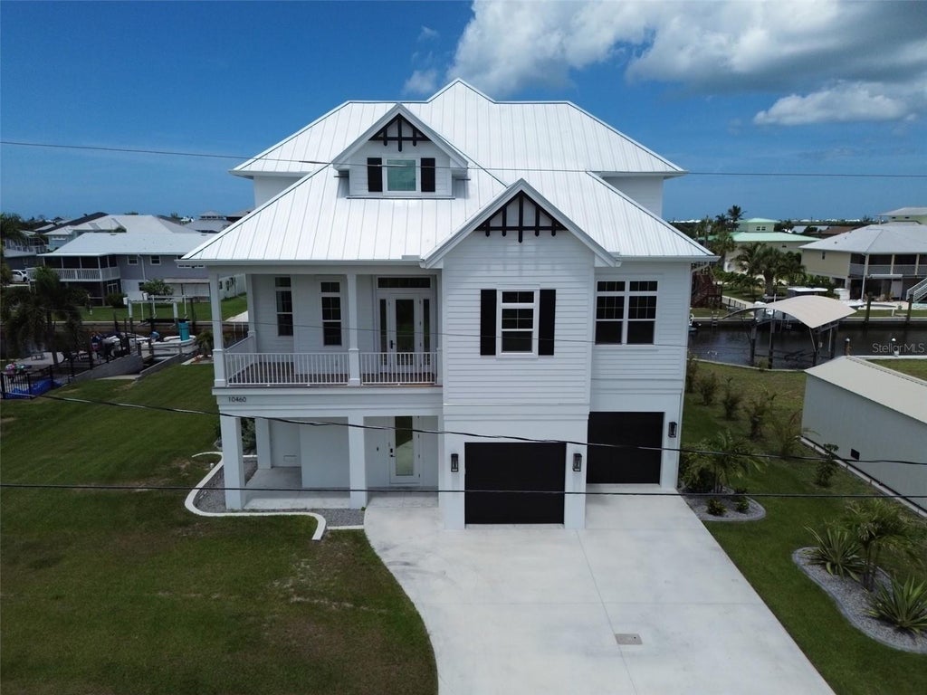 Photo of 10460 Raymond Street, Englewood, FL 34224 (MLS # A4696384)