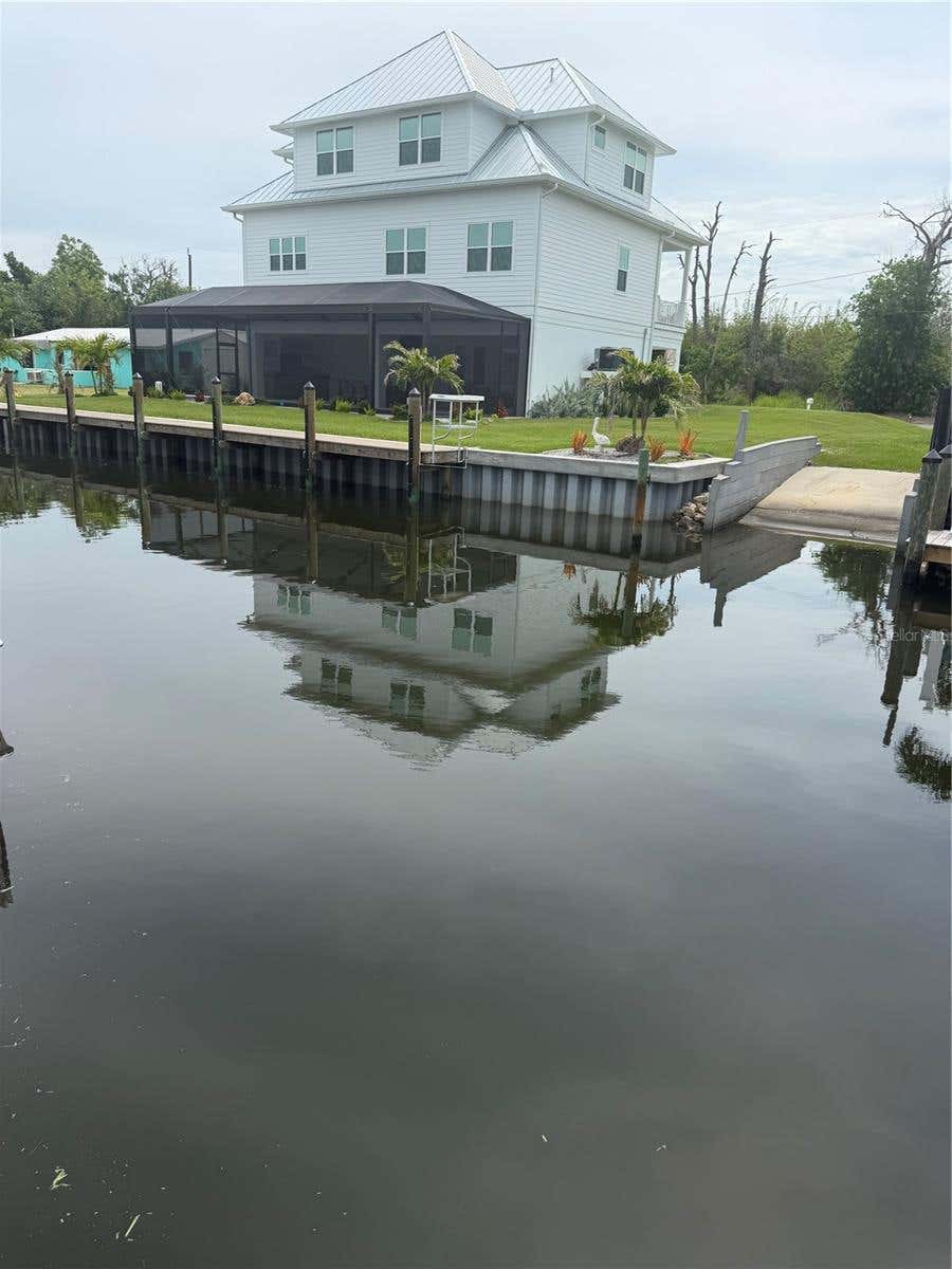 Photo of 10460 Raymond Street, Englewood, FL 34224 (MLS # A4696384)
