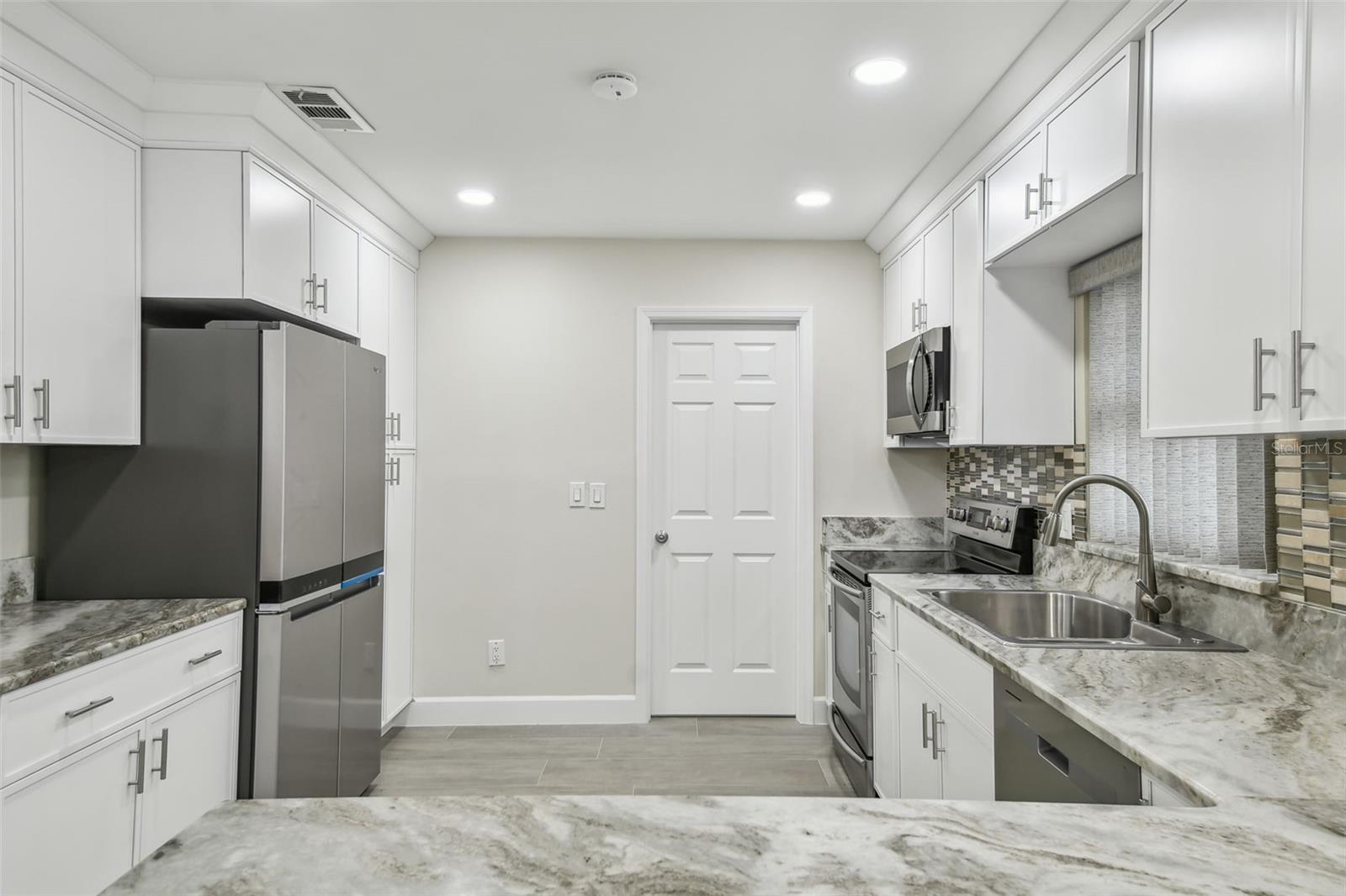 3938 VERSAILLES DRIVE