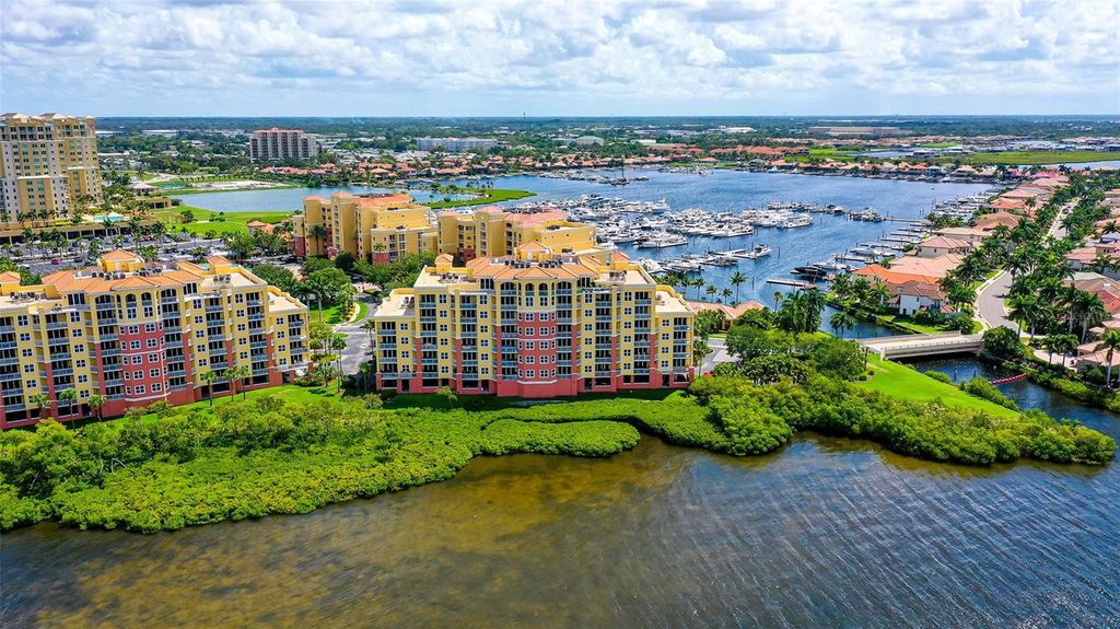Photo of 615 Riviera Dunes Way #208, Palmetto, FL 34221 (MLS # A4664706)