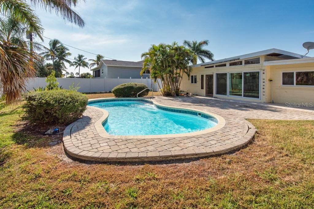 Photo of 6964 Grande Vista Way S, St Petersburg, FL 33707 (MLS # TB8442554)