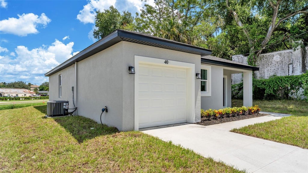 Photo of 40 Ash Street, Haines City, FL 33844 (MLS # L4964381)