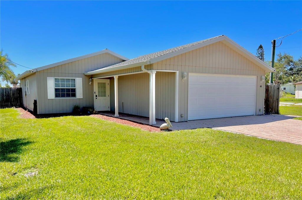 Photo of 47 Hatchett Creek Road, Venice, FL 34285 (MLS # O6434702)
