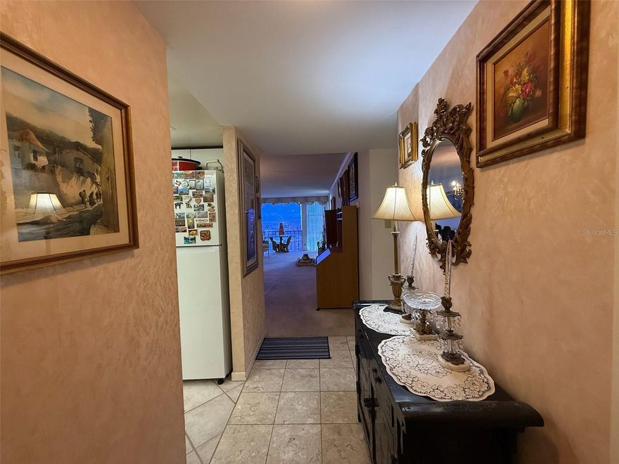 Resort-style living in a gated 55+ community on Boca Ciega Bay! This fully furnished 2BR/2BA condo (2nd bedroom converted to a den with sleeper sofa) is filled with antiques and collectables, featuring floor-to-ceiling windows with panoramic water views and abundant natural light. Community amenities include 6 pools, spa, tennis, pickleball, shuffleboard, marina, clubhouse, fitness center, and a 1.5-mile waterfront walking path. Laundry available on-site or in-unit. Covered parking included. Just minutes to St. Pete Beach, downtown St. Pete, dining, shopping, and cultural venues. Pet friendly, annual rental available.