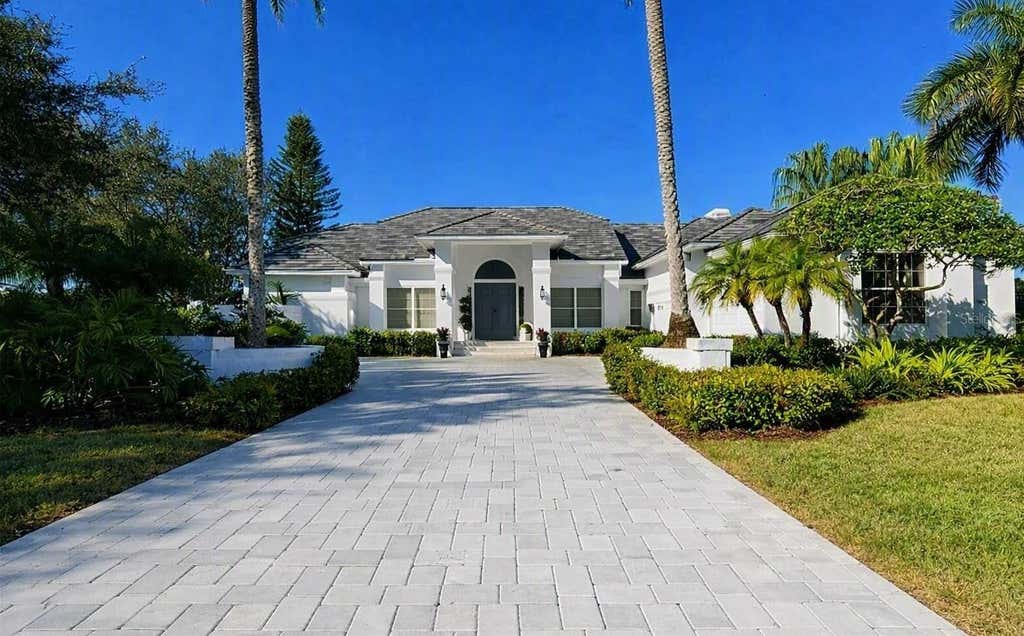 Photo of 447 E Macewen Drive, Osprey, FL 34229 (MLS # A4703990)