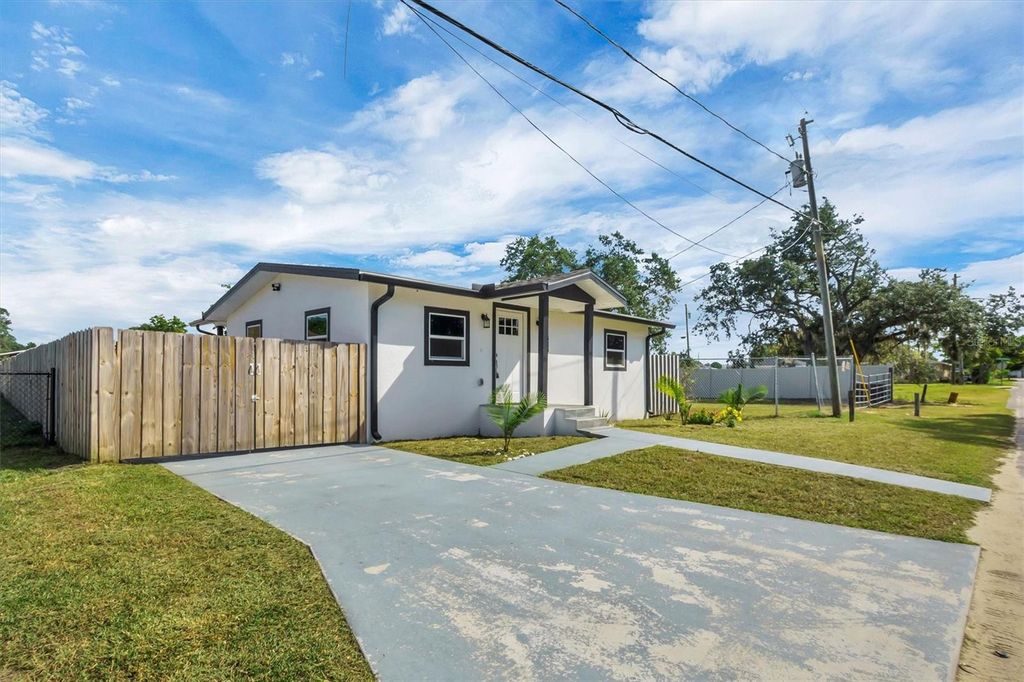 Photo of 414 Monroe Lane, Haines City, FL 33844 (MLS # S5135988)