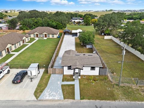 Photo of 414 Monroe Lane, Haines City, FL 33844 (MLS # S5135988)
