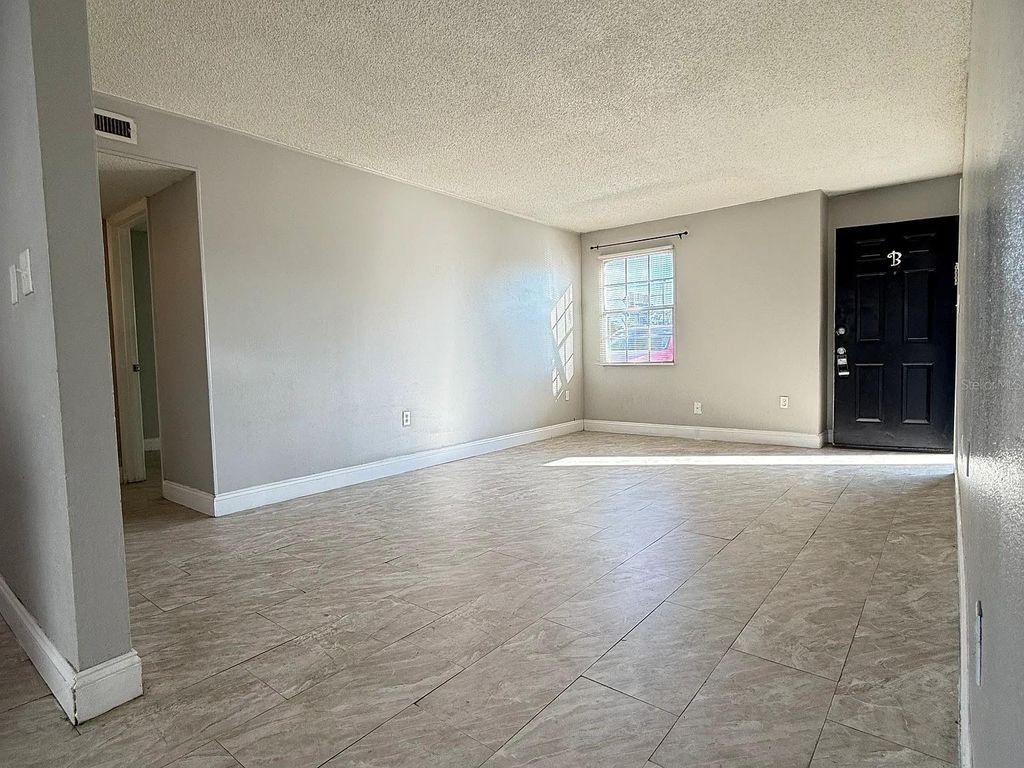 Photo of 2789 L B Mcleod Road #2789B, Orlando, FL 32805 (MLS # O6373109)
