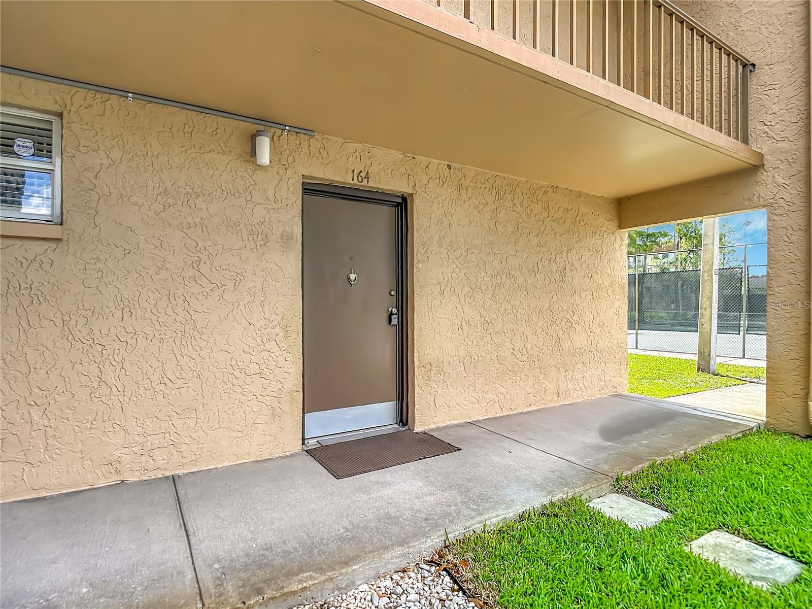 THE TAMPA RACQUET CLUB A CONDO - Residential