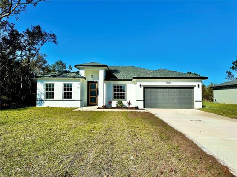 Photo of 5061 SW 150th Lane, Ocala, FL 34473 (MLS # O6290409) Photo of 5061 SW 150th Lane, Ocala, FL 34473 (MLS # O6290409)