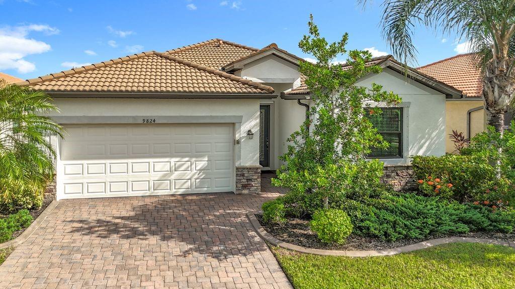 Welcome to your stunning new home in Watercrest—where maintenance-free living meets the very best of Florida lifestyle!Lovingly maintained by its original owners, this spacious 4-bedroom, 3-bath residence offers comfort, security, and style in equal measure. Thoughtful upgrades include hurricane-rated windows, sliders, garage door, and entryways—plus roof vent dampers to keep blowing rain at bay. The landscaping is framed by elegant concrete curbing, and the kitchen shines with a brand-new sink, faucet, and garbage disposal. Cool tile floors throughout offer effortless elegance and easy maintenance, while soaring ceilings and an open floor plan create a welcoming space to gather with loved ones and soak in breathtaking water views.The master suite features Jack and Jill closets, dual sinks, and a garden tub perfect for unwinding at the end of the day. A second primary suite offers its own ensuite bath with a walk-in Kohler tub and hydrotherapy jets—ideal for guests or those with mobility needs. Just steps from your private mailbox, the community pool and clubhouse invite you to swim, socialize, or stay active in the spacious exercise room. It’s the perfect blend of relaxation and connection.Whether you're drawn to the Gulf’s natural beauty or a round of golf, Watercrest places you minutes from it all. Explore the charm of downtown Venice with its boutique shops and beachside strolls, or head down Tamiami Trail to CoolToday Park, home of the Atlanta Braves spring training. For arts, music, and fine dining, Sarasota and Lakewood Ranch are just a short drive away. This cherished home has been the source of countless fond memories—now it’s your turn to make some of your own!