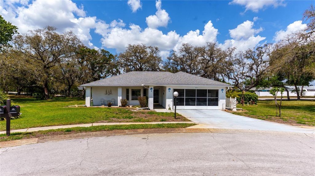 Photo of 8711 Gold Pine Dr, Port Richey, FL 34668 (MLS # W7884417)