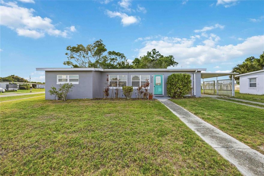 Charming 3-Bedroom Corner Lot Home in the Heart of Port Charlotte! NEW ROOF 2022. Whether you are a first-time buyer or savvy investor, this solid block-constructed home checks all the boxes. Freshly painted inside and out with charming curb appeal, this move-in ready gem sits on a spacious corner lot in a centrally located Port Charlotte neighborhood. Enjoy tile flooring throughout, a functional split bedroom layout, a convenient pass-through window from the living room to the kitchen, and a covered carport all with no HOA and no CDD fees.
Step outside to a sizeable screened-in porch with a private, peaceful backyard setting, perfect for relaxing or entertaining. Inside, you will find a dedicated laundry room complete with washer and dryer, plus a brand new tub liner in the bathroom. City water and sewer are already in place, adding long-term value and peace of mind. Built in 1958 with classic Florida block and stucco construction, the home features central A/C and is priced to move at $169,000. Whether you are looking for a great starter home or an investment property, this one is worth a look. Schedule your showing today.