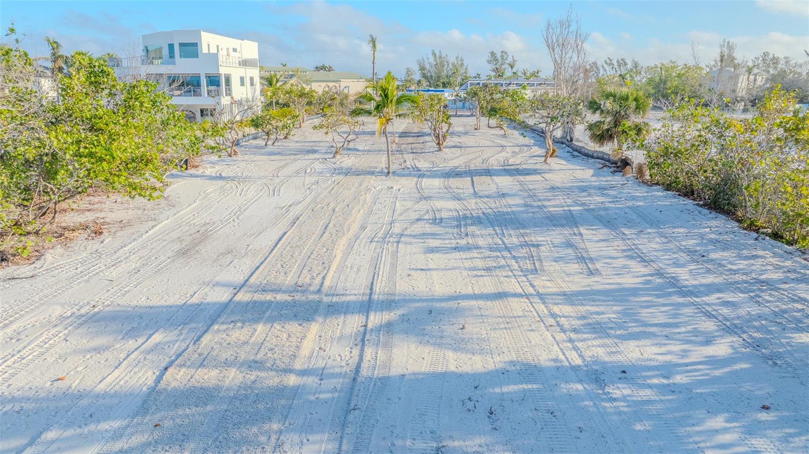 Sign on Property. Nestled on the pristine shores of Longboat Key, this exclusive beachfront property offers a rare opportunity to build your dream luxury home amidst the breathtaking beauty of the Gulf of Mexico. With direct access to the sugary sands and azure waters, this parcel of land (40,000 sq. ft. / 0.92 acres) promises an unparalleled coastal living experience. Spanning an expansive stretch of coastline, the property boasts uninterrupted views of the shimmering Gulf waters, where fiery sunsets paint the sky in hues of orange and pink, creating a mesmerizing backdrop for tranquil evenings spent by the water's edge. The land is currently zoned for its next chapter as a single-family home. Whether you envision a sleek modern masterpiece, a timeless Mediterranean villa, or a charming beach retreat, the possibilities are endless on this prime piece of real estate. Imagine waking up to the sound of gentle waves lapping against the shore and stepping out onto your own private oasis, where swaying palm trees and sea breezes evoke a sense of serenity and relaxation. Spend your days lounging on the beach, soaking up the sun, or partaking in water sports such as paddle-boarding, kayaking, or sailing right from your doorstep. Whether you seek a peaceful retreat to escape the hustle and bustle of everyday life or an exquisite setting to entertain family and friends, this beachfront gem on Longboat Key provides the perfect canvas for creating lifelong memories in an idyllic coastal paradise. Located in one of Florida's most beautiful coastal communities, this Longboat Key property offers not only unparalleled natural beauty but also convenient access to upscale dining, shopping, and recreational amenities. Indulge in world-class cuisine at nearby restaurants, tee off at championship golf courses, or explore the rich cultural offerings of Sarasota, just a short drive away. (Sarasota/Bradenton International Airport-16 miles; St. Armand’s Circle-10 miles; Access to I-75 N/S-23 miles; and Tampa International Airport-57 miles)