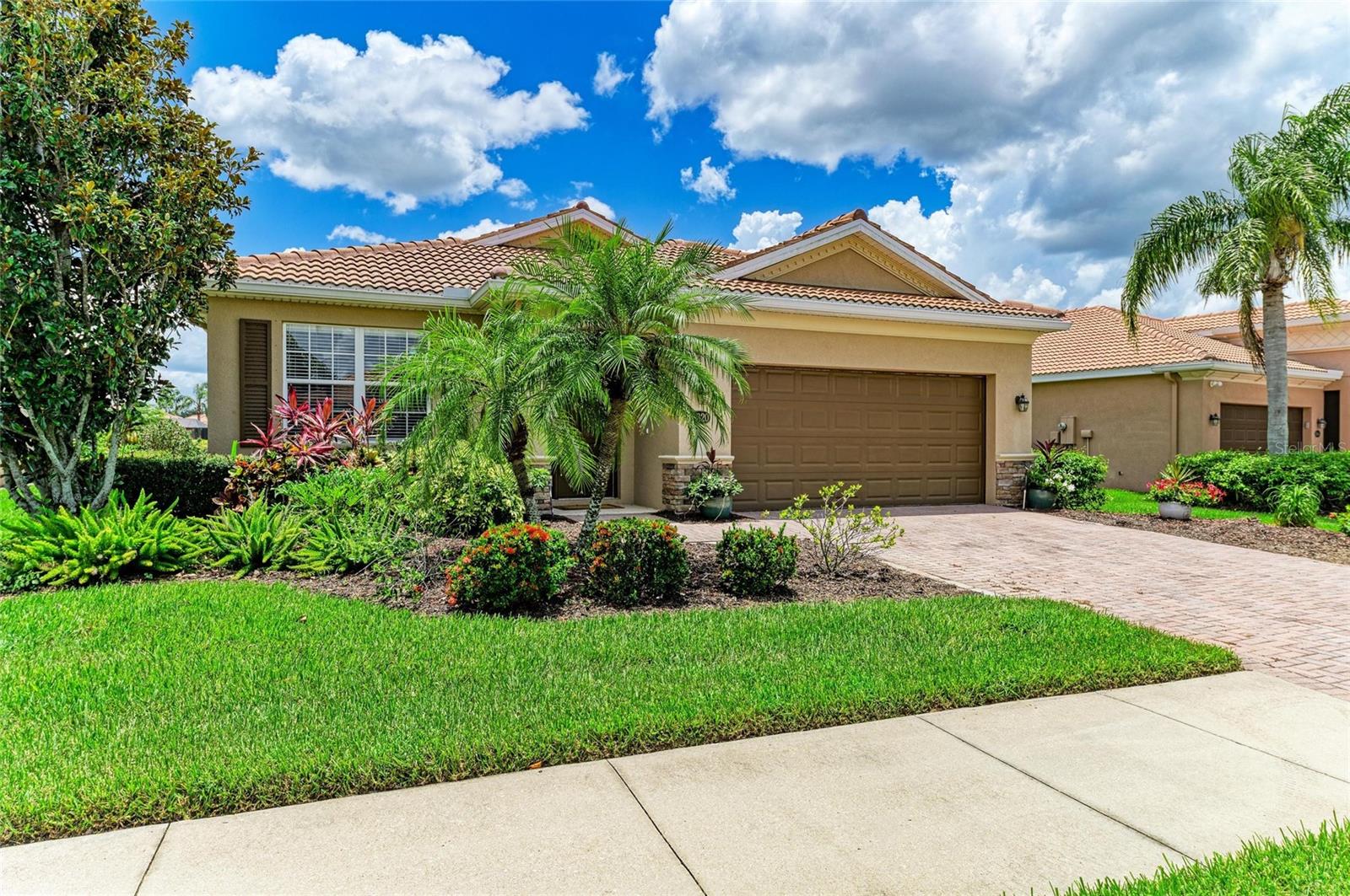 One or more photo(s) has been virtually staged. Stunning Lakefront Pool Home in Sought-After River Strand Golf & Country Club!
Welcome to your dream retreat! This beautifully updated 3-bedroom, 2-bath home with a versatile office/den offers the perfect blend of style, comfort, and resort-style living. Located on a large, tranquil lake, you'll enjoy peaceful water views from your private screened-in lanai featuring a sparkling pool and relaxing spa—ideal for unwinding or entertaining guests.
Step inside to discover a light and bright open floor plan with modern finishes throughout. The spacious kitchen flows effortlessly into the main living areas, while the office/den provides the flexibility for a home workspace, hobby room, or additional guest space.
Nestled in the prestigious River Strand Golf & Country Club, this gated community is renowned for its luxury lifestyle and world-class amenities. Golf enthusiasts will love the 27-hole championship course designed by Arthur Hills, while others can enjoy tennis, pickleball, a full clubhouse, restaurant, tiki bar, pro shop, state-of-the-art fitness center, and more.
Whether you're an avid golfer, social butterfly, or simply seeking a peaceful waterfront haven, this home offers it all in one of the area's most desirable communities. Don’t miss this rare opportunity—schedule your private showing today!